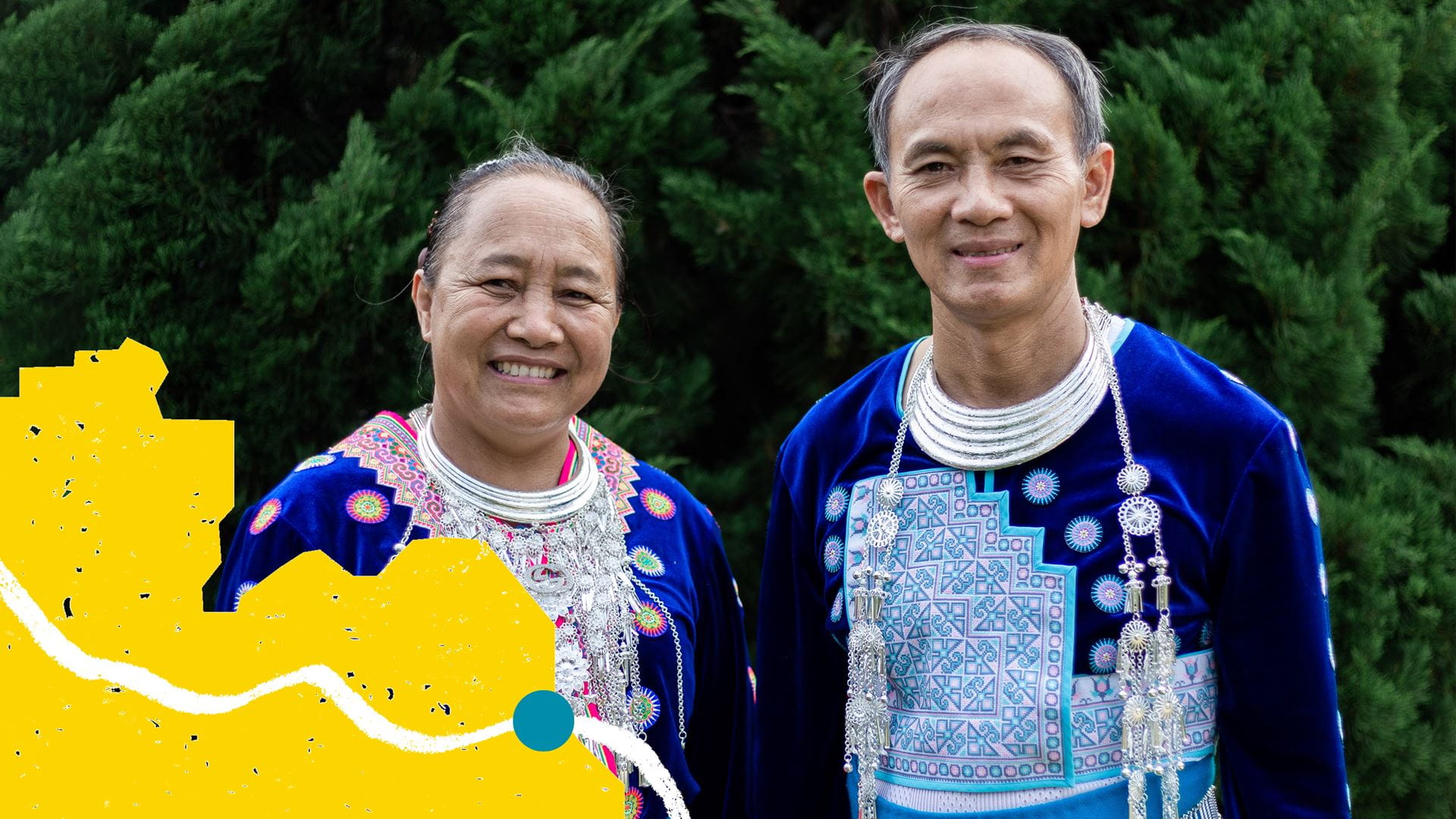 Pastor Leng of Thung Na Noi Church, with his wife Aumphai, wearing Hmong tribal costumes