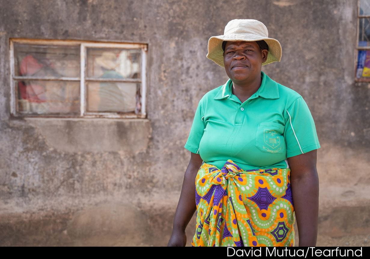 Florence outside her home in rural Zimbabwe 