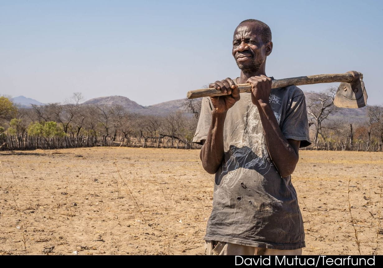 Mtshale stands at his now barren farm which he describes as a semi-arid desert. 