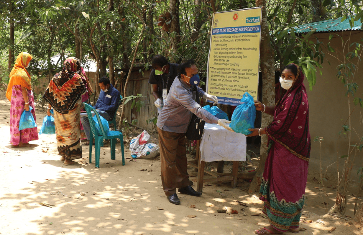 Rita Rani Bala (right) receiving hygiene kit from Tearfund’s local partner in Cox’s Bazar, Bangladesh Credit: Tearfund partner 