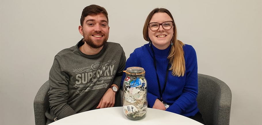 Jack Wakefield and Caitlin Collins with their jar of rubbish from 2019 (Tearfund).