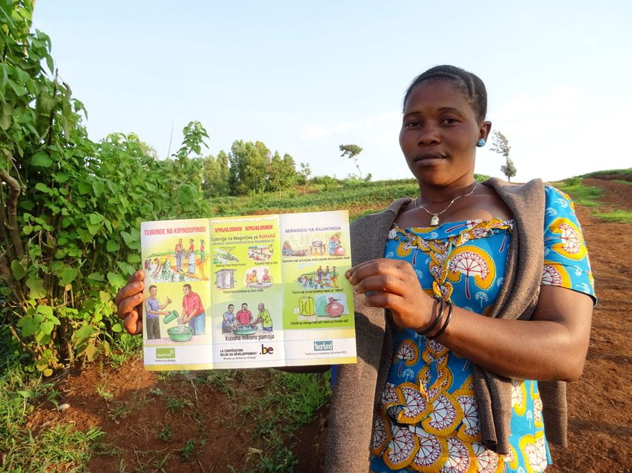 A beneficiary displayed the leaflet she received on hand-washing