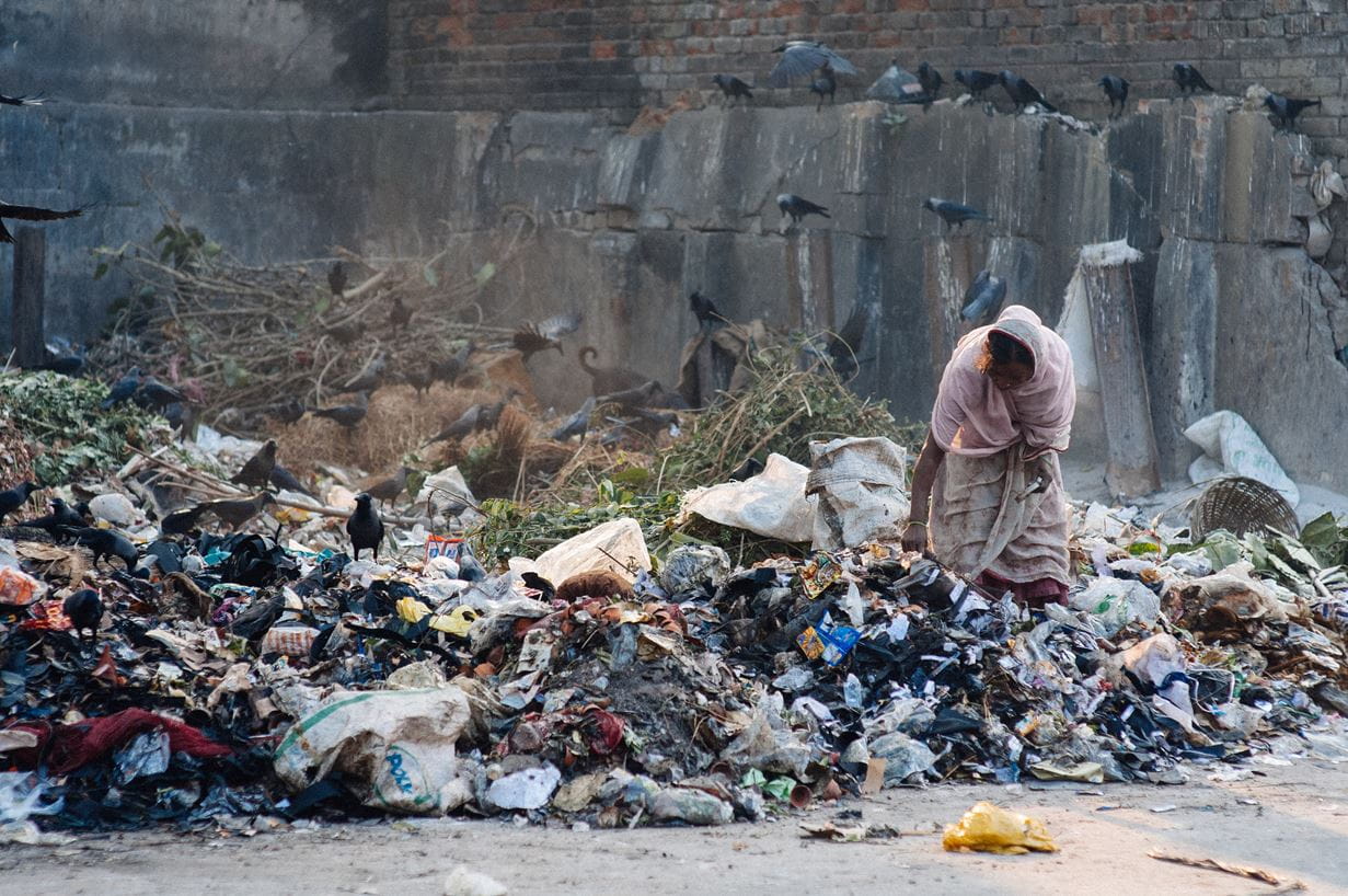 A local picks through waste in Calcutta, India. Andrew Philip/Tearfund