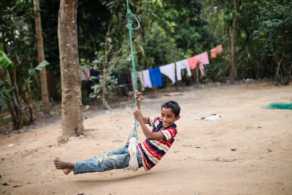 Child on a rope swing