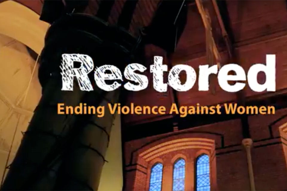 Restored logo on church background