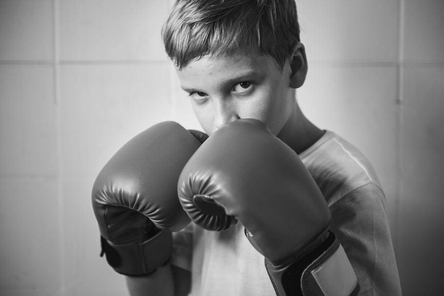 young boy boxing