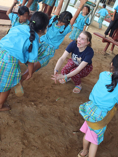 Grace in the playground with the children