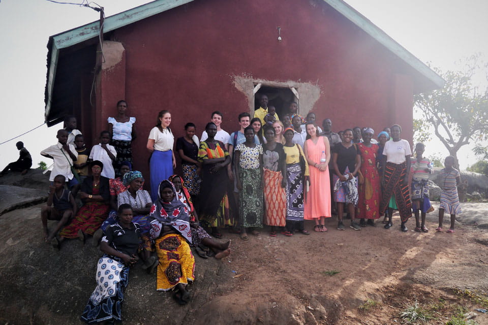 The women of Kwikuba with Tearfund volunteers
