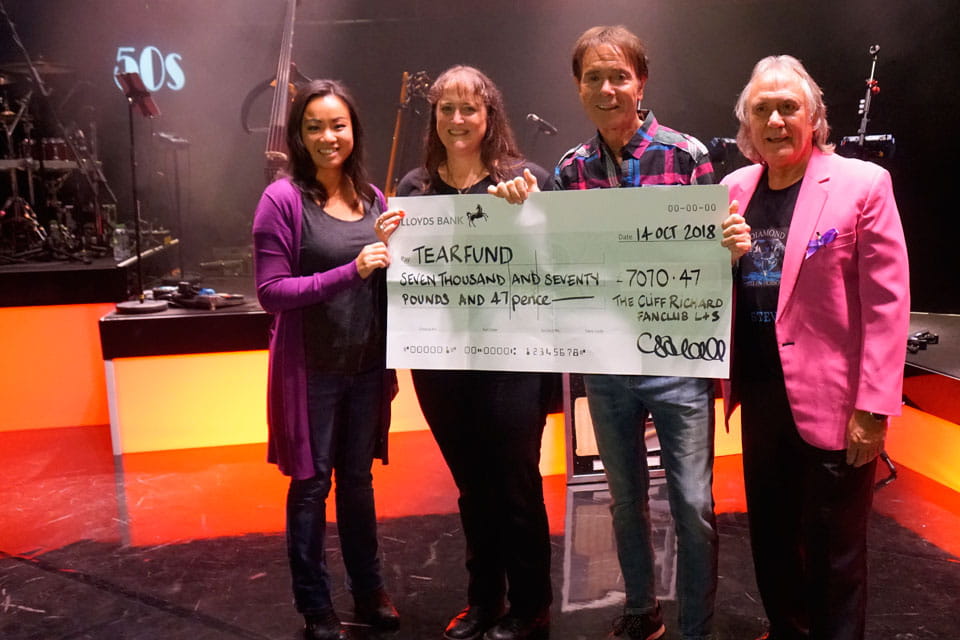 Sir Cliff and friends with giant Tearfund cheque