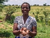 A woman holding vegetables