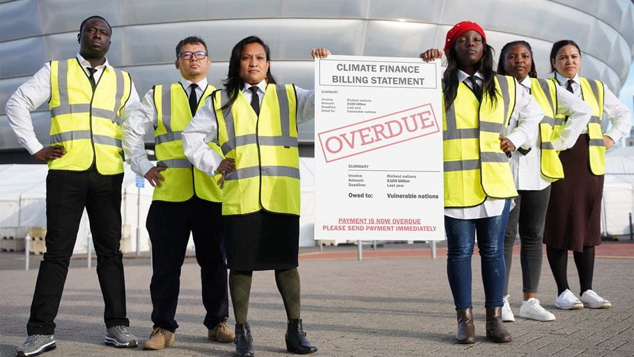 Overdue Bill stunt at COP26 (Jack Wakefield/Tearfund)