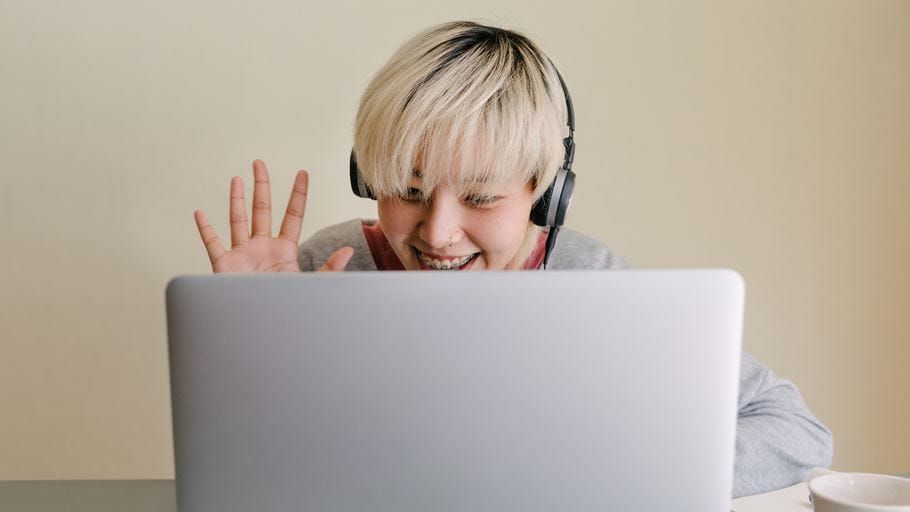Woman using laptop to make video call (Pexels)