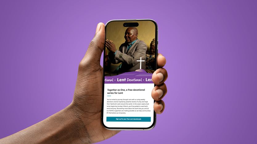 Image of the Lent Devotional on a mobile phone in someone's hand.