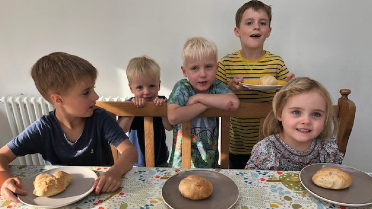 Five children at a table