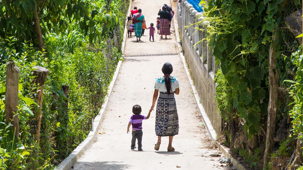 People walking down a path