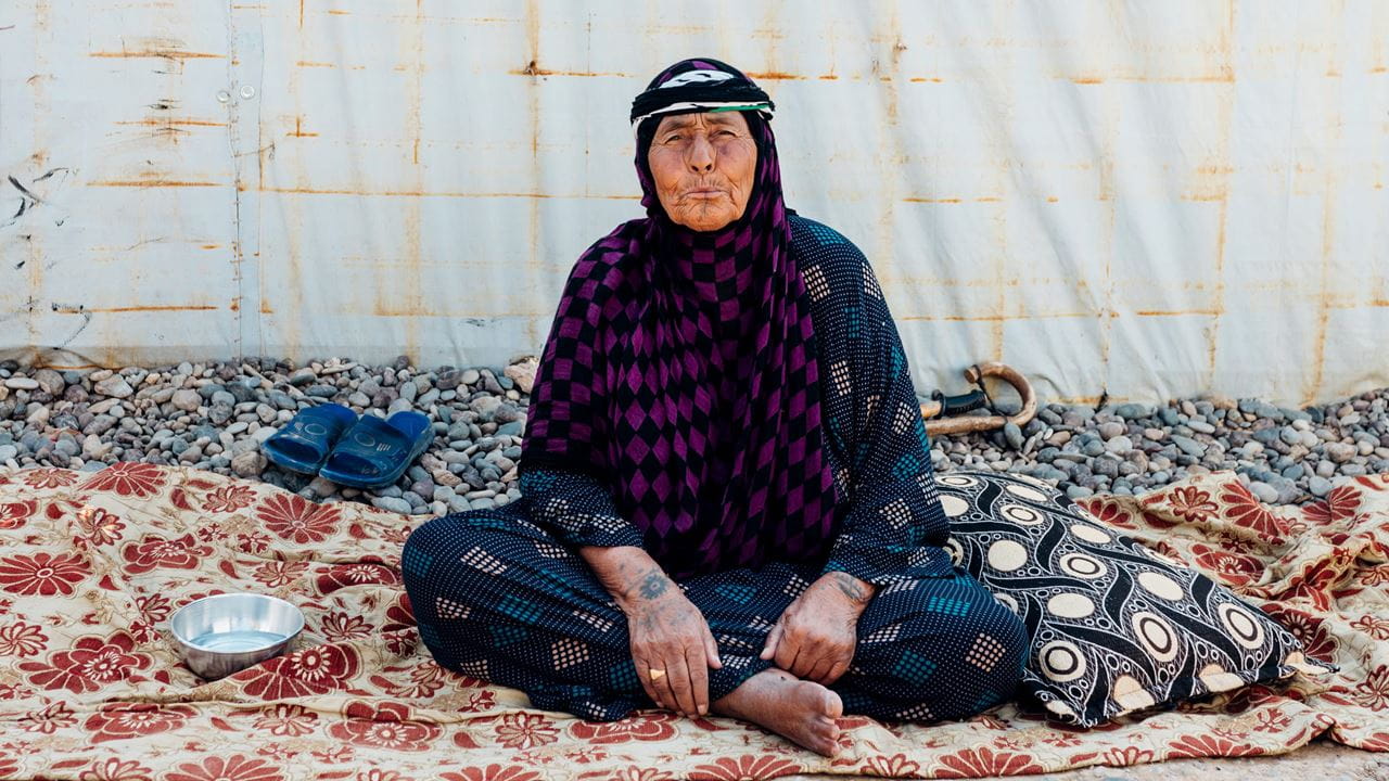 Zainab has traditional tattoos on her hands, to enhance her appearance, which people produce using local tools.