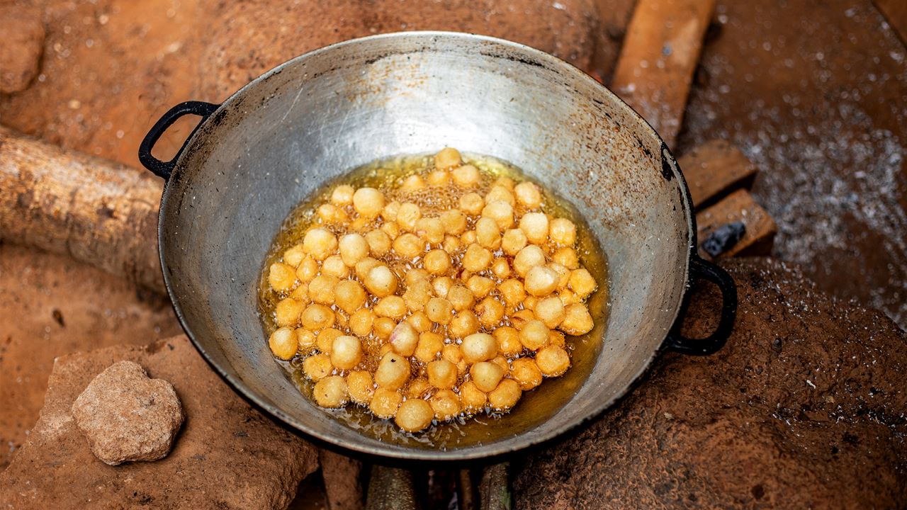 A pan containing small vegetables