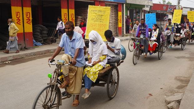 The Green Campaign rally across Parbatipur town.