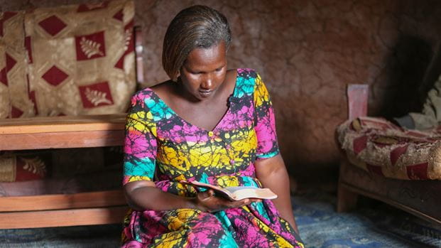 A woman reading a bible