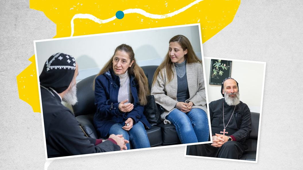 Photo of Ousanna and her mother meeting with Father Boutros. 