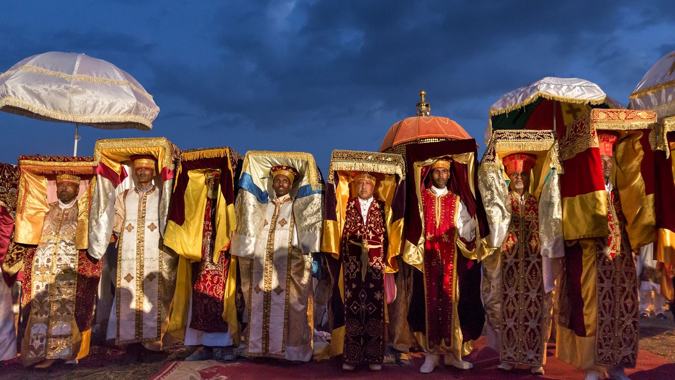 Priests carry the Tabot, a model of the Arc of Covenant, during Timket celebrations of Epiphany, commemorating the baptism of Jesus, in Addis Ababa, Ethiopia | Credit: Dejere/Shutterstock
