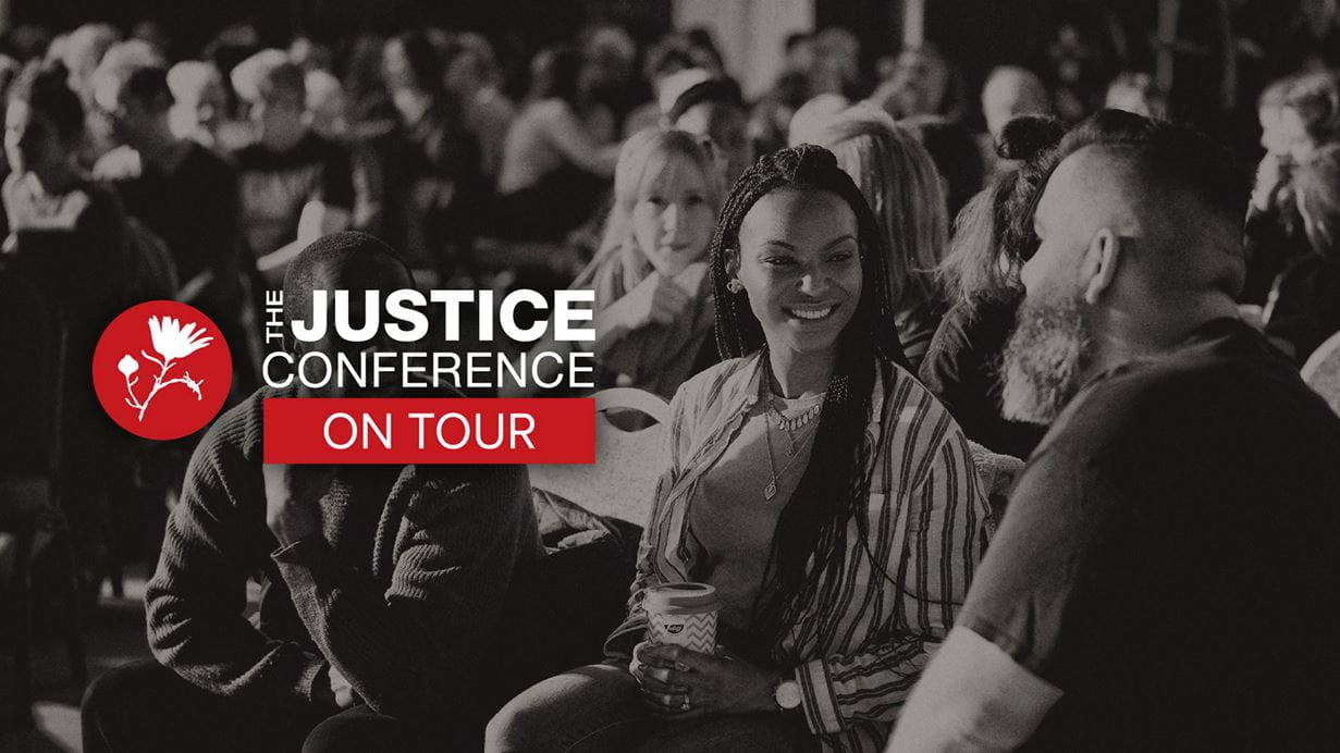 Black and white photo of the crowd at The Justice Conference