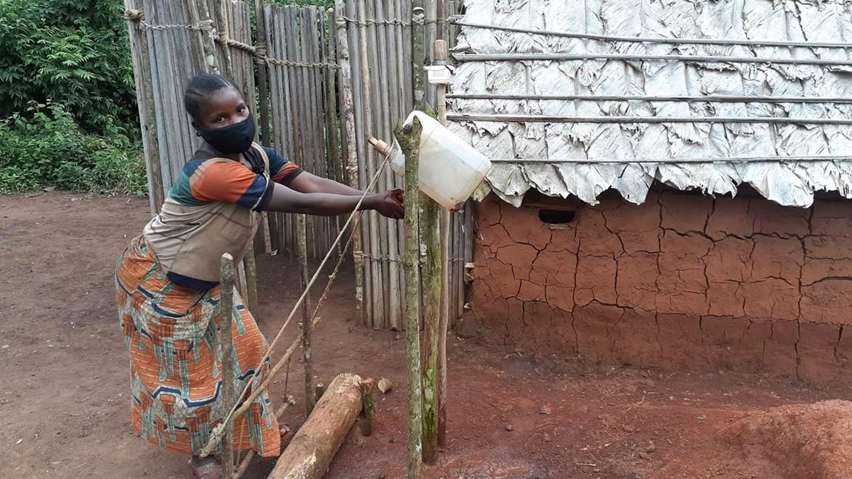 A woman washing her hands