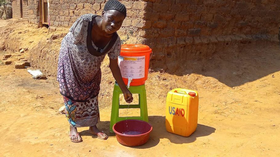 A woman washing her hand