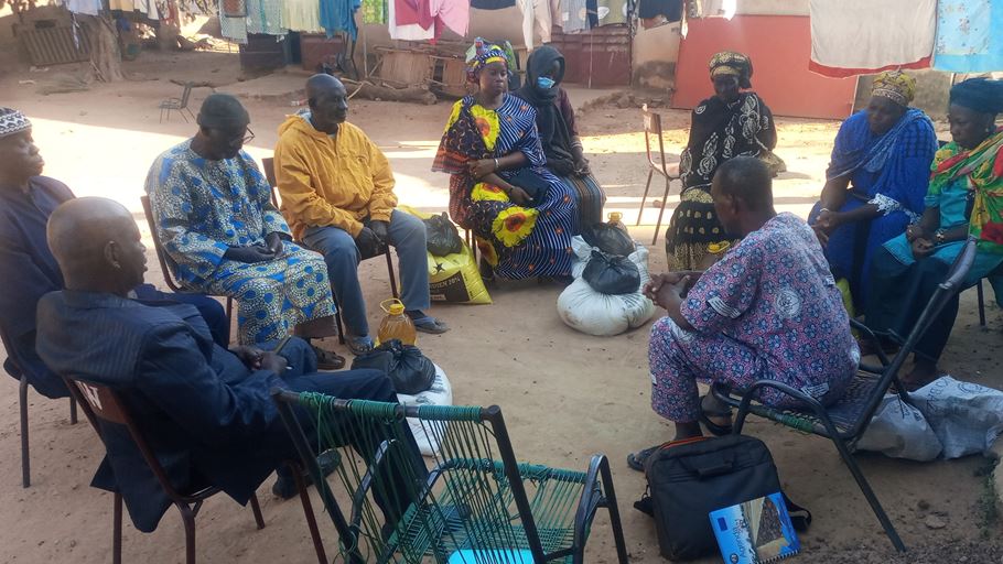 A group of people sitting in a circle