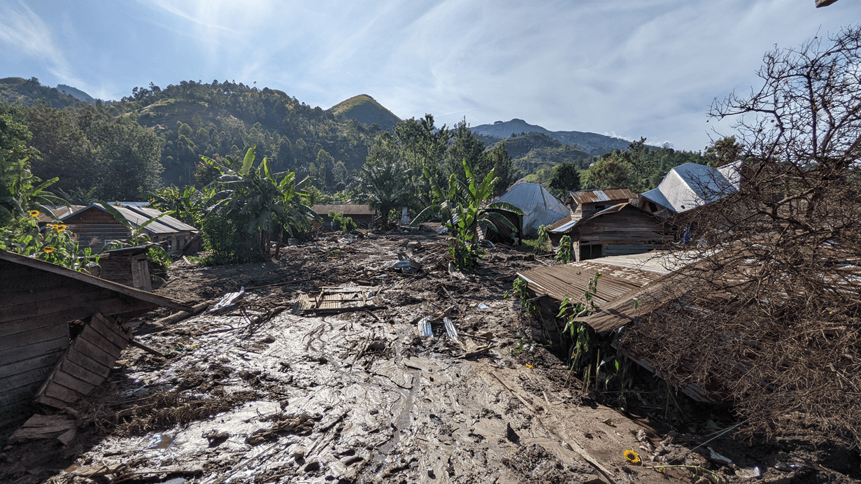 Buildings in Democratic Republic of Congo submerged in mud after floods and landslides destroyed villages and caused hundreds of deaths.