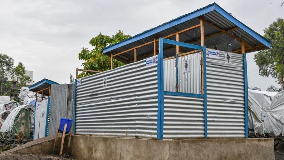 Latrines for men and women in a camp