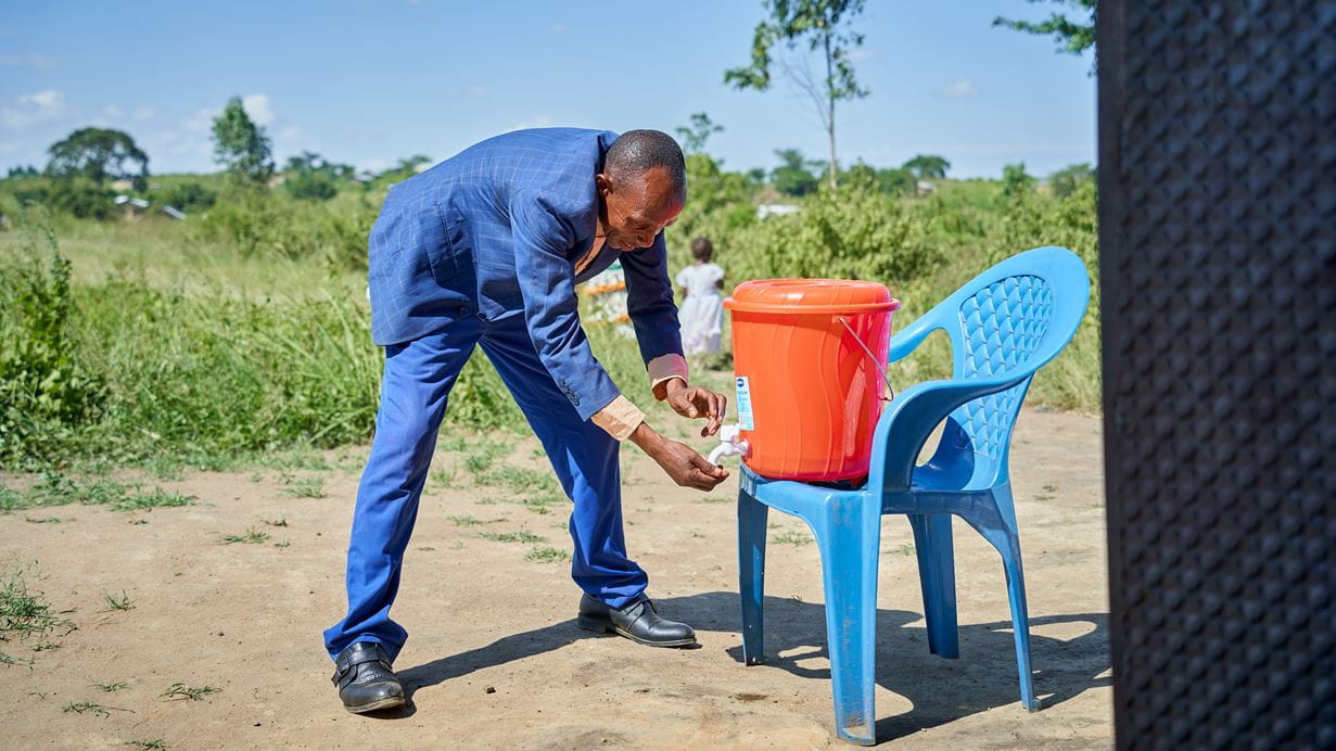 pastor washing hands