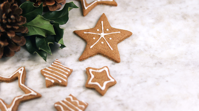 Christmas cookies in the shape of stars (Lydia Matzal via Unsplash)